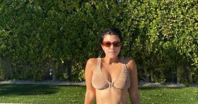 41-летняя Кортни Кардашян в "голом" бикини эротично позировала возле бассейна