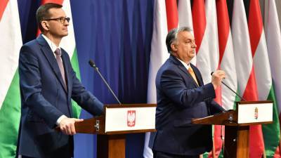 Виктор Орбан - Владимир Соловейчик - Матеуш Моравецкий - Эксперт рассказал, почему Польша и Венгрия не идут на ультиматум ЕС - riafan.ru - Венгрия - Польша - Будапешт - Брюссель