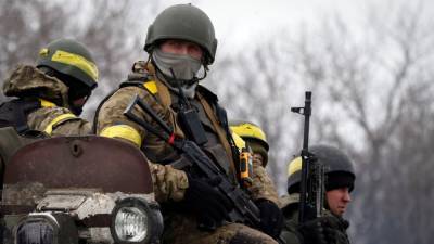 На Донбассе киевский боевик избил, ограбил и поджег сослуживца