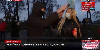 Неизвестный в прямом эфире вырвал у журналистки NEWSONE микрофон и разбил лампадку — видео - nv.ua