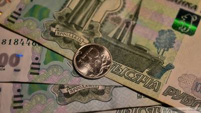 Определенные факторы позволят рублю укрепиться к доллару