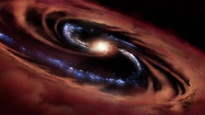 Астрономы обнаружили галактику, которая сильнее черных дыр: как это удалось