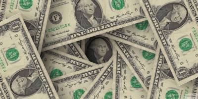 Экономисты скорректировали курс доллара к концу года