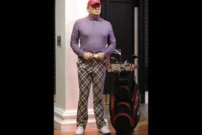 Восковую фигуру Трампа переодели в костюм для гольфа