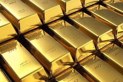 Золото коррекционно дорожает в ожидании пакета помощи экономике США