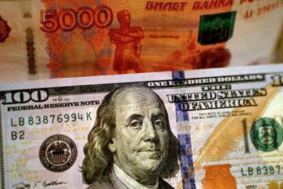 Средневзвешенный курс доллара снизился до 73,12 рубля