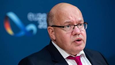 Берлин: Антироссийские санкции не особо вредят экономике Германии