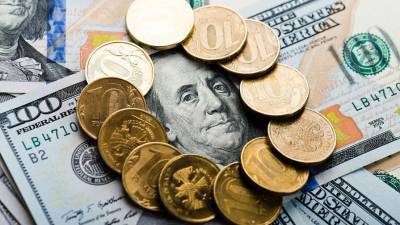 Банкир ожидает снижения курса доллара до 65 рублей