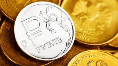 Банкир спрогнозировал укрепление рубля к доллару
