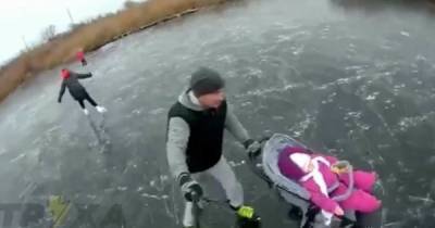 Безумное скольжение: в Харькове родители устроили маленькому ребенку катание на подмерзлом озере (видео)