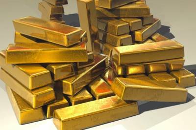 Цена золота впервые с ноября поднялась выше $1,9 тыс. за тройскую унцию