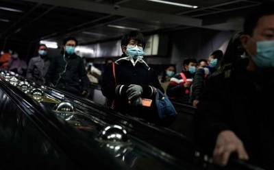 Китайцев заставят носить маски после вакцинации