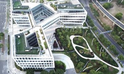 Природа и технологии: фото впечатляющего офисного центра в Шанхае