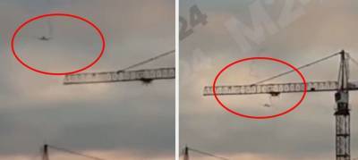 Дымящийся самолет над Москвой сняли на видео очевидцы