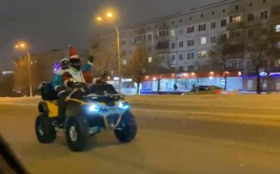 В Кемерове заметили Деда Мороза и Снегурочку на квадроцикле