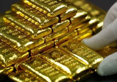 Золото дорожает после принятия пакета стимулирования экономики США