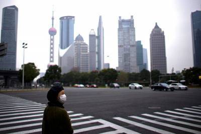 Китайские акции закрылись в минусе за счет сырьевого и энергетического секторов