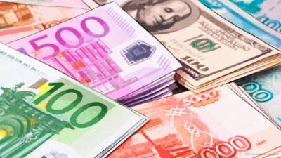 Банк России вновь понизил официальные курсы доллара и евро