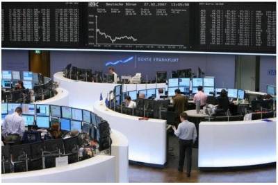 Европейские биржи закрылись снижением, DAX закончил год у рекорда