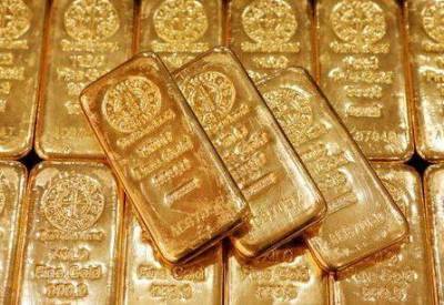 Золото может закончить неделю в плюсе благодаря ослаблению доллара