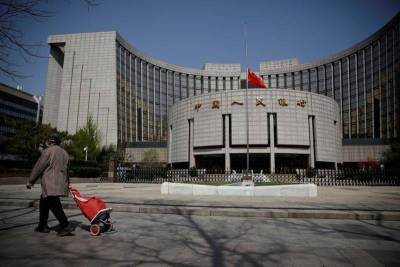 ЭКСКЛЮЗИВ-Рост юаня пока не беспокоит чиновников КНР -- источники