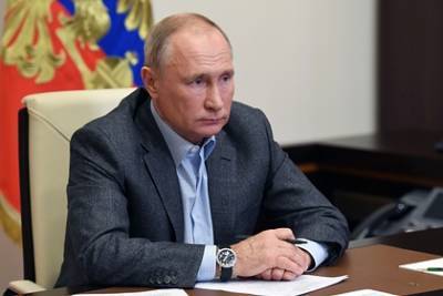 Путин пошутил о пропавших одновременно участнике совещания и штативе