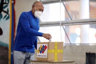 "Голосовать за что?": оппозиция Венесуэлы бойкотировала парламентские выборы, принесшие победу сторонникам Мадуро