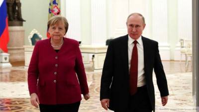 Путин и Меркель остались довольны соблюдением перемирия в Донбассе