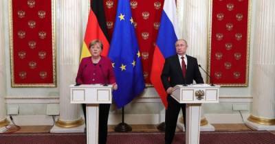 Путин обсудил с Меркель по телефону перемирие на Донбассе