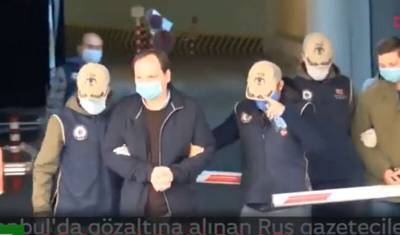 Подозреваемые в шпионаже журналисты НТВ вернулись из Турции в Россию