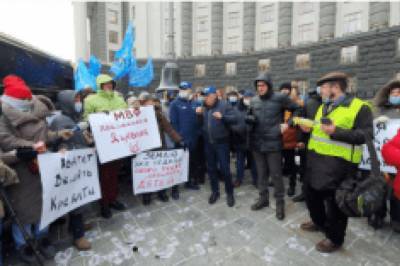 Активисты Молодежного крыла ОПЗЖ провели акцию против МВФ в Киеве