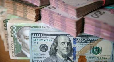Гривня укрепилась к доллару: свежие курсы валют