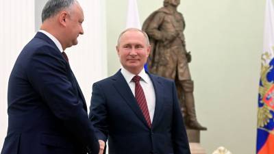 Додон поздравил Путин с Днем России