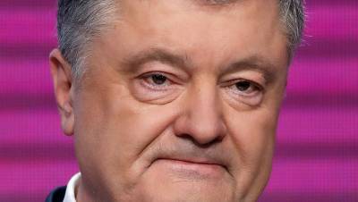 В Киеве начался допрос Порошенко по делу Януковича