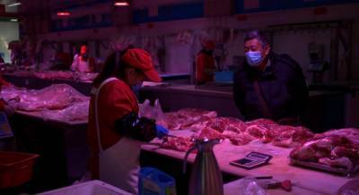 Китай обвиняет в новой вспышке COVID-19 ввезенный лосось