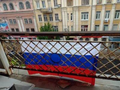 Боевики освободили супругу испанского подданного, которая сняла с дома в Донецке российский флаг