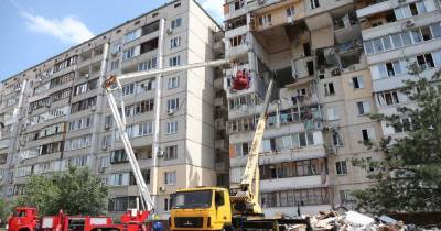 В Киеве прощаются с жертвами взрыва доме на Позняках