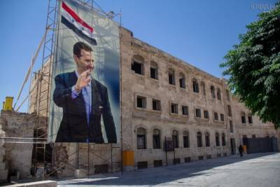 Асад восстанавливает разрушенную боевиками инфраструктуру, ремонтируя дороги в Даръа