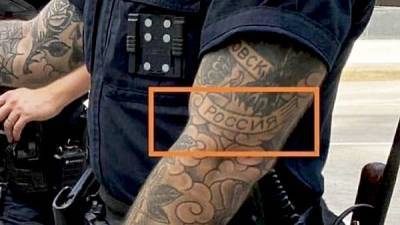СМИ узнали имя американского полицейского с татуировкой «Россия»
