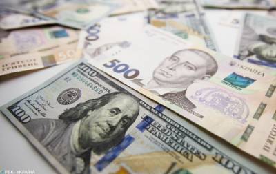 НБУ решил повысить официальный курс доллара на 30 июня