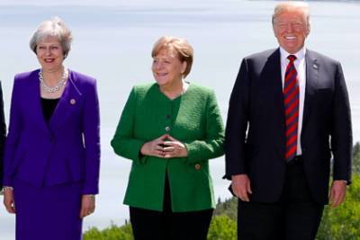 Стало известно об унижении Меркель и Мэй Трампом