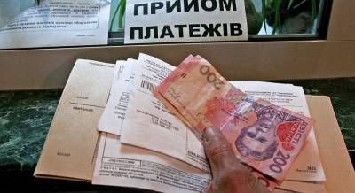 Уже ниже 60 миллиардов гривень: украинцы сокращают долги за коммуналку