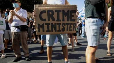 Участники демонстрации против Нетаниягу требуют его отставки