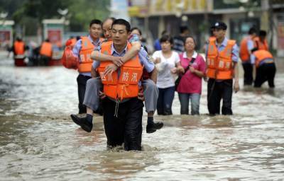 В Китае почти 38 млн человек пострадали от наводнения. Погибли более 140 человек