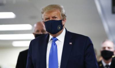 Трамп в маске и новый антирекорд: как коронавирус захватывает США