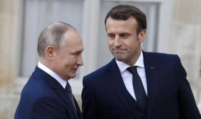 Путин поздравил Макрона с Днем взатия Бастилии
