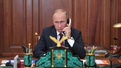 Путин провел телефонные переговоры с Меркель
