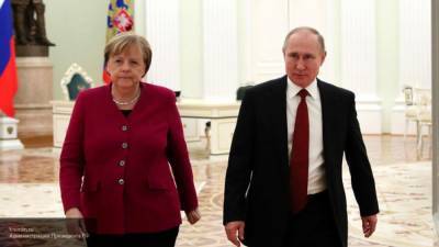 Меркель обсудила с Путиным вопросы Донбасса, Ливии и Ирана