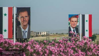 Башар Асад проголосовал на выборах в Национальный совет Сирии в Дамаске