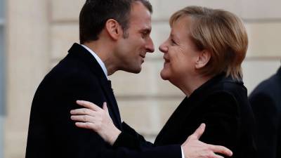 Макрон и Меркель оценили итоги саммита ЕС